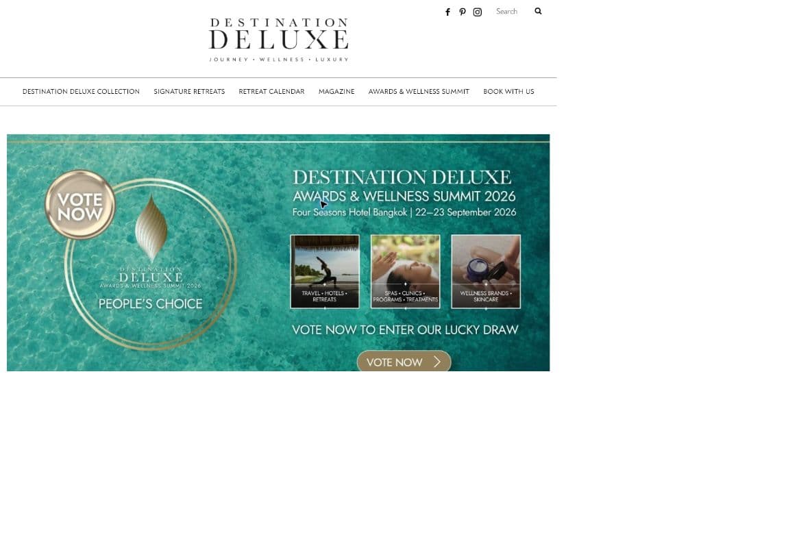 Destination Deluxe homepage shown inside a neon computer frame
